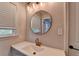 Bright bathroom features a vanity with storage beneath and modern fixtures at 780 N Ola Rd, Mcdonough, GA 30252