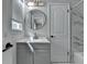 Clean bathroom featuring a vanity with storage, a mirror, and tile flooring at 780 N Ola Rd, Mcdonough, GA 30252