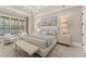 Inviting main bedroom features tray ceilings, decorative lighting, and a neutral color palette at 001 Knob Creek Ct, Acworth, GA 30101