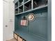 Charming mudroom features a bench with storage and a built-in shelving unit at 001 Knob Creek Ct, Acworth, GA 30101