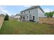 Large backyard with a covered patio perfect for outdoor entertaining with a fenced-in yard at 123 Academy Ln, Canton, GA 30114