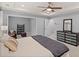 This light and airy main bedroom features a tray ceiling, carpet, and walk-in closet at 123 Academy Ln, Canton, GA 30114