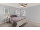 This is a bedroom with neutral walls, carpet, and a white queen bed at 123 Academy Ln, Canton, GA 30114