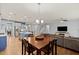 Open concept living space with modern kitchen, dining area, and living room for easy entertaining at 123 Academy Ln, Canton, GA 30114