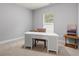 Simple home office area with a clean desk and a comfortable chair at 123 Academy Ln, Canton, GA 30114