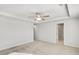 Spacious primary bedroom with tray ceilings, recessed lighting, and ensuite bath access at 129 Kenney Way, Locust Grove, GA 30248