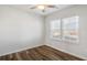 Bright bedroom with natural light and neutral walls, creating a cozy and inviting atmosphere for relaxation at 129 Kenney Way, Locust Grove, GA 30248