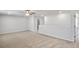 Expansive loft area with neutral carpet and recessed lighting, perfect for relaxing at 129 Kenney Way, Locust Grove, GA 30248