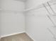 Walk-in closet with wire shelving for optimal storage at 129 Kenney Way, Locust Grove, GA 30248