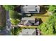 Birds eye view shows roof and layout with yard and neighborhood street at 167 E Lake Se Ter, Atlanta, GA 30317