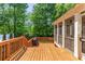 Outdoor deck with outdoor seating, adjacent to the screened-in porch at 167 E Lake Se Ter, Atlanta, GA 30317