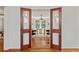 View through glass doors to the home office with hardwood floors and view to the outdoors at 167 E Lake Se Ter, Atlanta, GA 30317