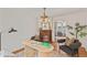 Cozy home office with fireplace, decorative chandelier, and neutral colors at 167 E Lake Se Ter, Atlanta, GA 30317
