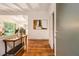 View of living room leads into the dining area; gleaming hardwood floors at 2700 Brook Park Way, Doraville, GA 30340