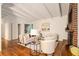 Bright living room with hardwood floors, brick fireplace, and open layout at 2700 Brook Park Way, Doraville, GA 30340
