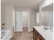 A spacious bathroom with dual access to a walk in closet at 436 Vermeer Ct, Locust Grove, GA 30248
