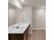 A modern bathroom shows sleek cabinets, lighting and bright counters at 436 Vermeer Ct, Locust Grove, GA 30248