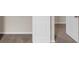 Bedroom shows open door and neutral carpet at 436 Vermeer Ct, Locust Grove, GA 30248