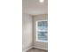 Bedroom features a window with a view at 436 Vermeer Ct, Locust Grove, GA 30248