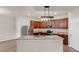 Modern kitchen with stainless steel appliances and a granite-topped island at 436 Vermeer Ct, Locust Grove, GA 30248