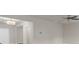 Spacious living room with modern lighting and ceiling fan, great for entertaining and relaxation at 436 Vermeer Ct, Locust Grove, GA 30248