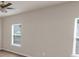 Bright living room featuring neutral paint, lots of natural light and space for entertaining at 436 Vermeer Ct, Locust Grove, GA 30248