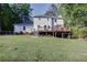 Expansive backyard with deck provides ample space for outdoor activities and relaxation at 5083 Lambeth Nw Ct, Acworth, GA 30101