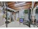 Unfinished basement space ready for customization with visible utilities and workout equipment at 5083 Lambeth Nw Ct, Acworth, GA 30101