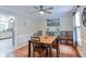 Inviting dining room featuring hardwood floors, dining table set, and natural light at 5083 Lambeth Nw Ct, Acworth, GA 30101