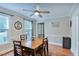 Welcoming dining area with hardwood floors, dining table set, and natural lighting at 5083 Lambeth Nw Ct, Acworth, GA 30101