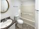 Functional bathroom with a vanity sink, toilet, and bathtub with shower at 5537 Panola Pl, Lithonia, GA 30058