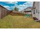 Large backyard with a wood fence and a patio area with seating at 637 Little Bear Loop, Canton, GA 30114