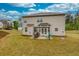 Nice backyard with a seating area and a view of the house at 637 Little Bear Loop, Canton, GA 30114