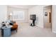 Comfortable bonus room with neutral carpet and natural lighting at 637 Little Bear Loop, Canton, GA 30114