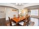 Expansive dining room features hardwood floors, views to entryway and a sun-drenched window at 637 Little Bear Loop, Canton, GA 30114