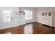 Inviting entryway with hardwood floors, a coat rack, and a bright window providing natural light at 637 Little Bear Loop, Canton, GA 30114