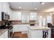 Eat-in kitchen with stainless appliances, granite countertops, and an eat-in kitchen at 637 Little Bear Loop, Canton, GA 30114