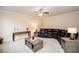 Spacious living room with ceiling fan, plush carpeting, and neutral paint at 637 Little Bear Loop, Canton, GA 30114