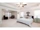 Spacious main bedroom featuring a sitting area with large windows for natural light at 637 Little Bear Loop, Canton, GA 30114
