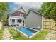 Beautiful backyard with a refreshing in-ground pool and cozy outdoor seating area at 655 Moreland Se Ave, Atlanta, GA 30316