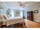Inviting bedroom with hardwood floors and a large wardrobe at 655 Moreland Se Ave, Atlanta, GA 30316