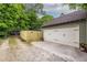Exterior showing the detached garage and driveway at 655 Moreland Se Ave, Atlanta, GA 30316