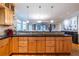 Bright kitchen featuring a breakfast bar with modern pendant lighting at 655 Moreland Se Ave, Atlanta, GA 30316