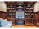 Office area featuring custom bookshelves and storage cabinets at 655 Moreland Se Ave, Atlanta, GA 30316