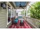 Relaxing front porch with comfortable seating, a ceiling fan, and a view of the street at 655 Moreland Se Ave, Atlanta, GA 30316