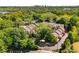 Gorgeous aerial view of the community surrounded by lush trees, close to nearby roadways at 1420 Defoors Nw Dr, Atlanta, GA 30318