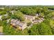 Beautiful aerial view of community nestled amongst mature trees and professional landscaping at 1420 Defoors Nw Dr, Atlanta, GA 30318