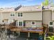 Back exterior of home featuring private decks and garage space below at 1420 Defoors Nw Dr, Atlanta, GA 30318