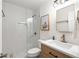Updated bathroom featuring glass enclosed shower, stylish vanity, and modern fixtures at 1420 Defoors Nw Dr, Atlanta, GA 30318