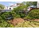 Lush backyard with mature trees, bench, and shaded lawn at 24 Daniel Se St # 3, Atlanta, GA 30312